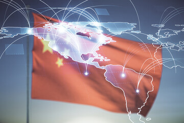 Double exposure of abstract digital world map hologram with connections on Chinese flag and sunset...