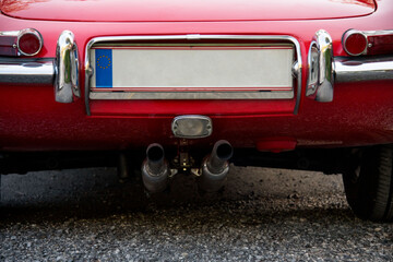 rear view of a classic red sports car