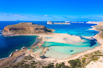 Amazing view of Balos Lagoon with magical turquoise waters, lagoons, tropical beaches of pure white sand and Gramvousa island on Crete, Greece