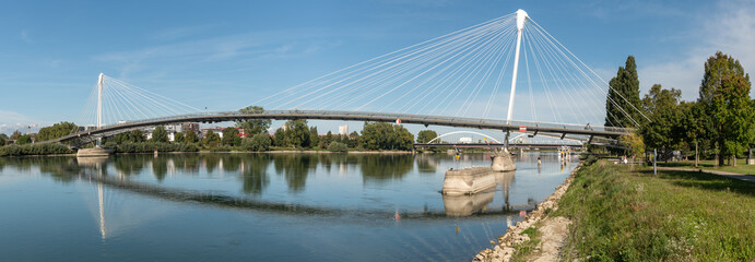 Fototapeta na wymiar Deux Rives footbridge, bridge for pedestrians and cyclists on the Rhine between Kehl and Strasbourg.