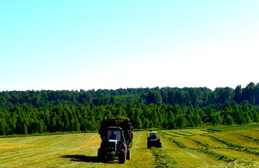 Tractor. Aerial view. tractor in field. farmer plowing his fields in a beautiful autumnal landscape. Aerial view of summer country farming landscape