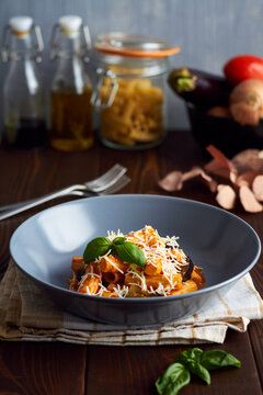 pasta alla norma with eggplant ricotta tomato sauce copy space