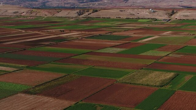 Aerial drone view of a crop fields in the andes of Huancayo, Junin, Peru.
