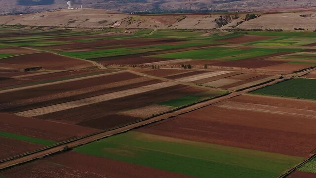 Aerial drone view of a crop fields in the andes of Huancayo, Junin, Peru.