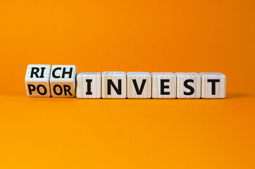 Rich or poor invest symbol. Turned wooden cubes and changed words poor invest to rich invest. Beautiful orange table, orange background, copy space. Business and rich or poor invest concept.