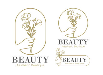 feminine hand holding flower beauty logo template