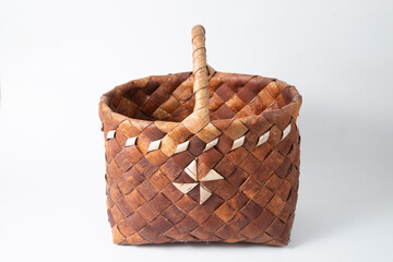 Birch bark basket on a white background.Handmade basket.