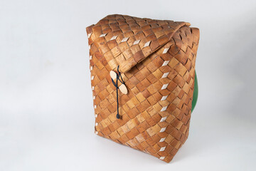 Birch bark basket on a white background.Handmade basket.