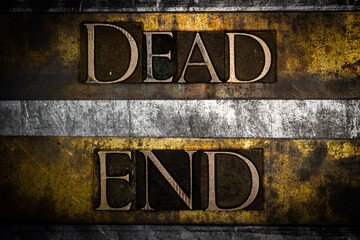 Dead End text on vintage textured grunge copper gold and silver background