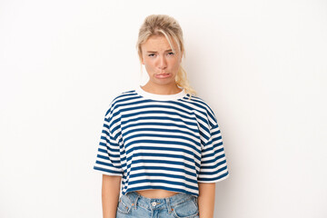 Fototapeta premium Young Russian woman isolated on white background sad, serious face, feeling miserable and displeased.