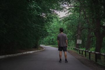 A man walking in the forest
