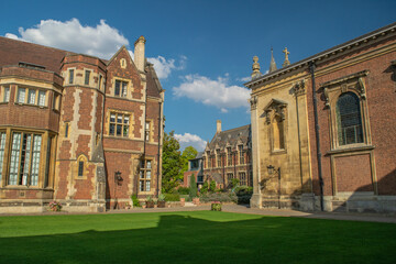 Fototapeta na wymiar Historical Buildings ofChrist's College Court in front of lawn and garden at Cambridge England