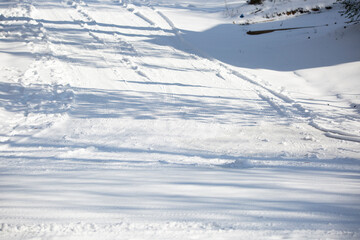 Obraz premium Tire Tracks in the Snow