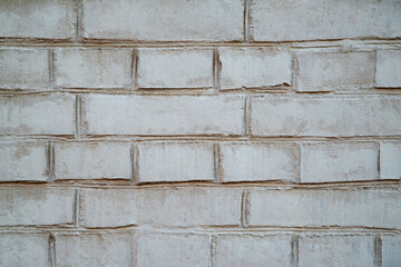 White grunge brick wall background. Cracked White Brick Wall. White Stone Wall.