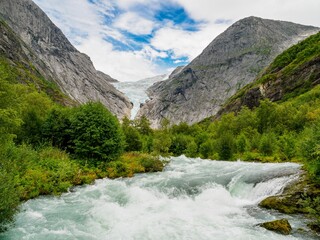Fototapeta na wymiar Briksdalbreen glacier and its water torrent, Jostedalsbreen National Park, Norway.