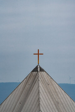 golden cross on church