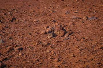 red sand and volcanic stones, Canary Island soil closeup -