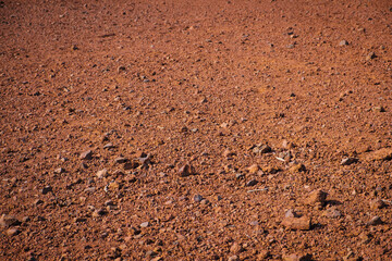 red sand and volcanic stones, Canary Island soil closeup -