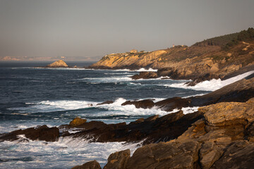Fototapeta na wymiar Brave sea hitting the coast at the Basque Country.