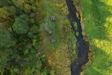 Beautiful colors of autumn. Forest, meadow and river photographed with a drone on sunny day. Regional park of neris in Lithuania. Dukstai educational trail. Real is beautiful  