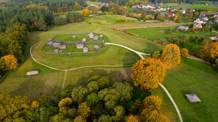  Kernave in beautiful autumn colors photographed with a drone. Kernave was a medieval capital of the Grand Duchy of Lithuania and today is a tourist attraction and an archeological site. 