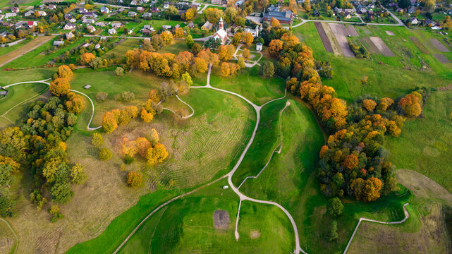  Kernave in beautiful autumn colors photographed with a drone. Kernave was a medieval capital of the Grand Duchy of Lithuania and today is a tourist attraction and an archeological site. 