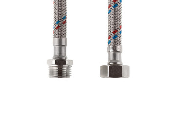 Flexible liner for water supply on a white background. Close-up of flexible metal braided hose.