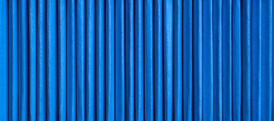  blue vertical lines of cardboard boxes for background or texture