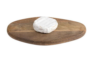 Camembert on a white background. Camembert cheese on a board close-up on a white background.