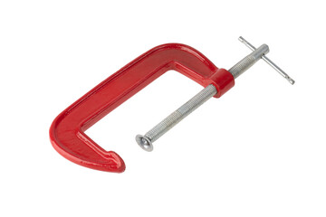 Red clamp on a white background. Joiner's clamp close-up.
