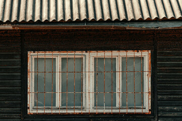 Old worn prefabricated wooden house detail