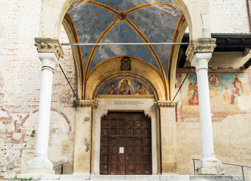 The protiro with frescoed lunette depicting Holy Mary on the fa&ccedil;ade of the church of San Francesco in Bassano del Grappa, province of Vicenza, Veneto region, Italy 