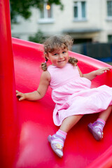 Fototapeta na wymiar child playing in the playground