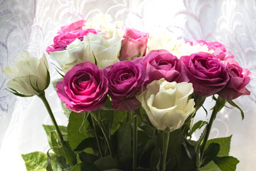 Close-up of bouquet of white and pink roses