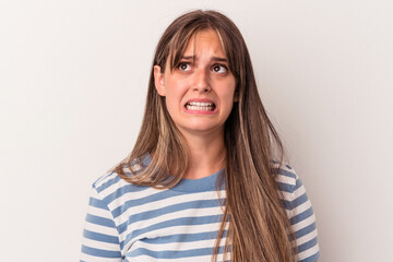 Fototapeta premium Young caucasian woman isolated on white background shouting very angry, rage concept, frustrated.