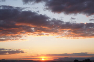 dramatic sky skyline background. orange clouds at sunset 