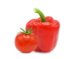 Fresh whole tomato and bell pepper isolated on white background.