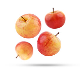 Flying whole red yellow apple isolated on white background.