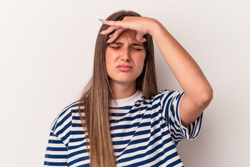 Young caucasian woman isolated on white background touching temples and having headache.