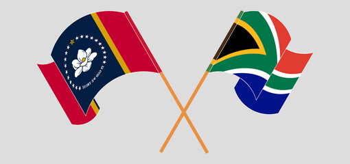Crossed and waving flags of The State of Mississippi and Republic of South Africa