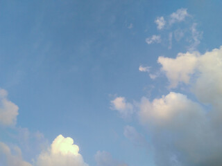 Dramatic weather conditions, natural scenery view of colorful clouds and sun in sky, nature photography, cloudy background