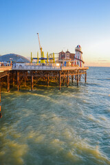 UK, Brighton, 01.10.2021: Brighton's big famous pier. Close up view during sunset
