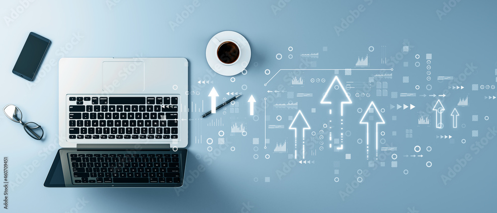 Fototapete top view of laptop on desktop background with abstract business chart interface with upward arrow. f