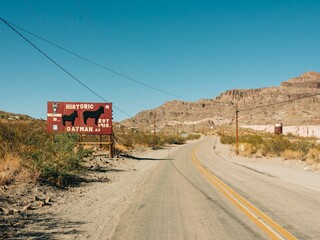 Route 66 and Welcome to Oatman sign in Arizona