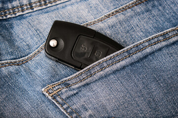 Car key, engine ignition key left in jeans pocket after coming home, weak security, high probability of the car being stolen