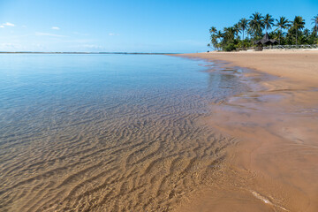 Idyllic beach with crystal clear water in Taipus de Fora, Marau, State of Bahia, Brazil