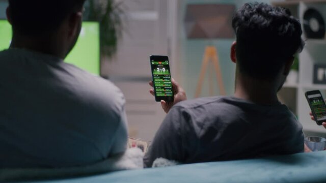 Football fans making bets in online app