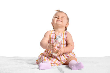 Cute baby girl with bottle of water on white background