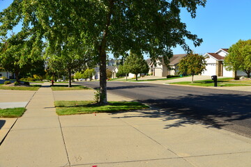 View of modern residential neighborhood in Bismarck, North Dakota. Clean streets, clean air and relatively low crime rate create a favorable living environment.