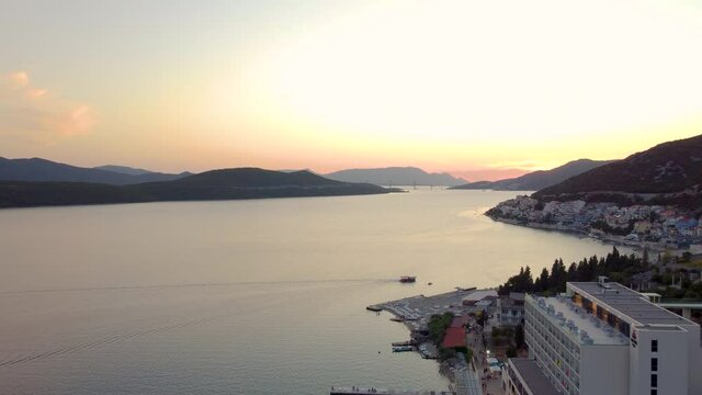 Aerial View Of The Coast Of Neum At The Adriatic Sea During Sunset - drone shot